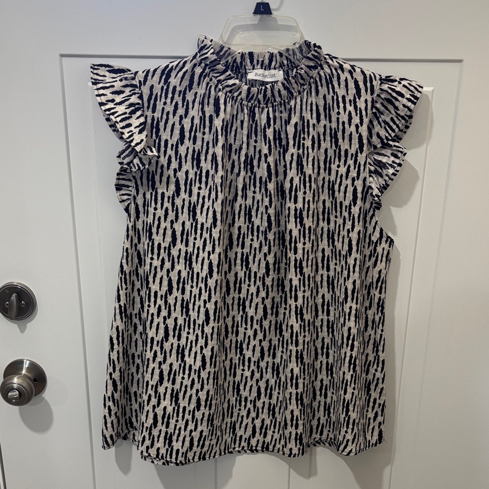 BUCKETLIST Black & White Ruffle Mock-Neck Sleeveless Blouse
